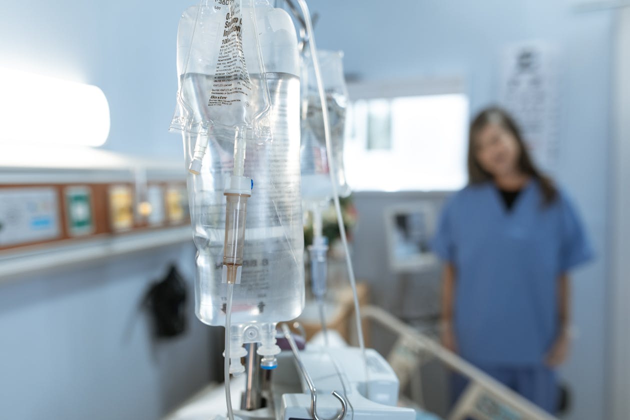 A styled close-up of an IV drip bag